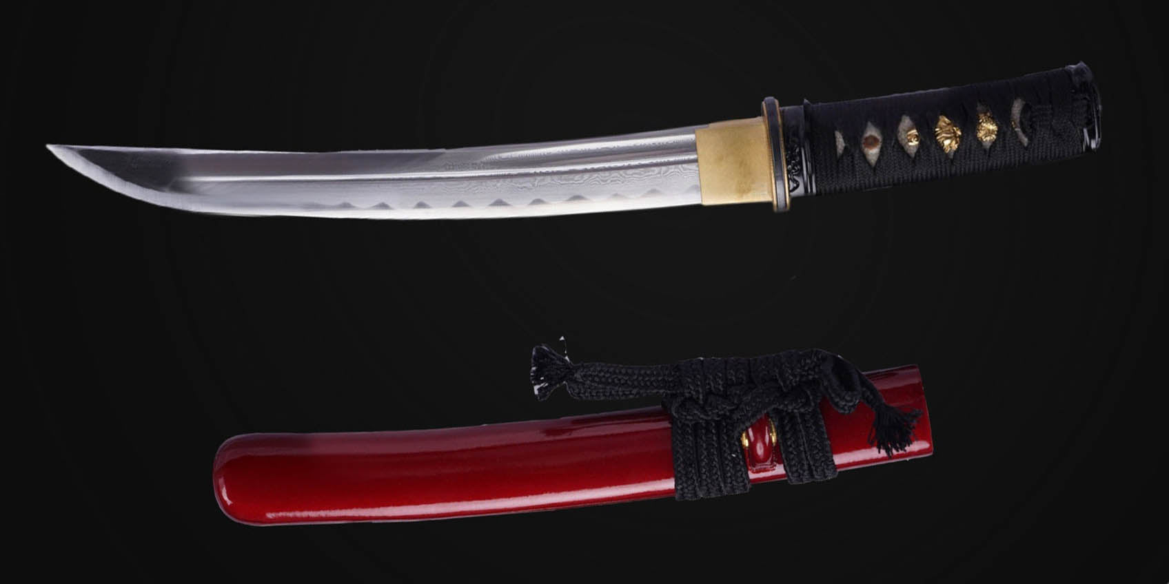Close-up detail of Japanese tanto blade showing hamon temper line